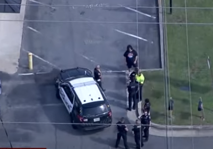 Shooting at Marietta Auto Shop Leads to Police Standoff (Video)