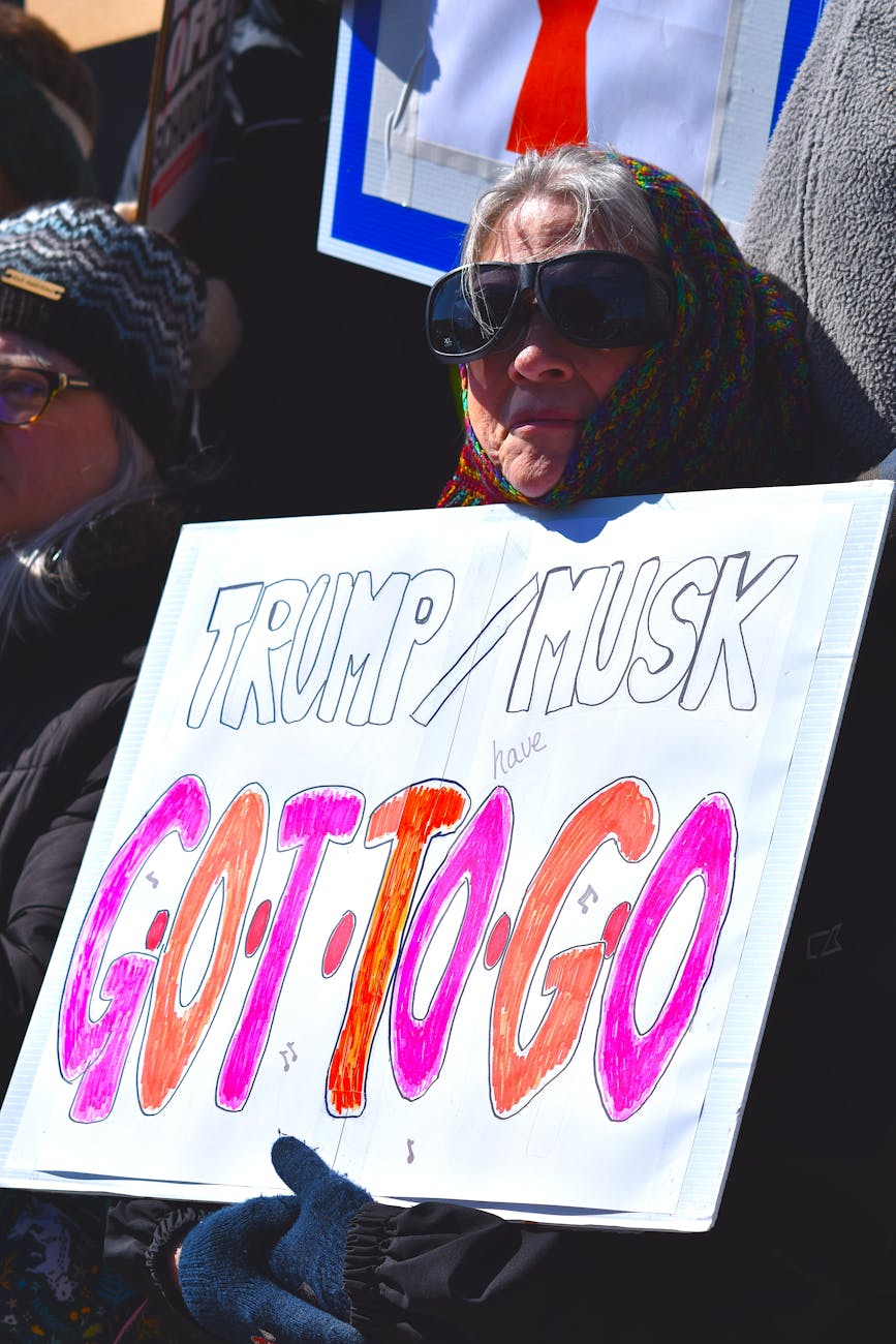 Musk and Trump shake hands at Kirk memorial, months after rift