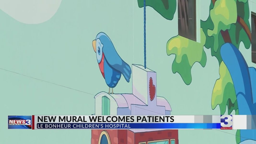 Artist shares journey of painting new Le Bonheur mural (Video)