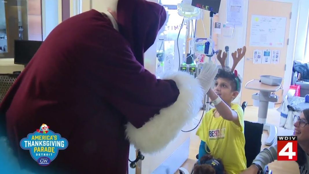 Santa and Paws bring holiday cheer to Mott Children’s Hospital mini parade! (Video)